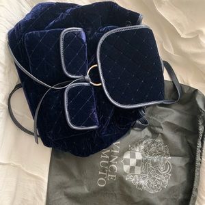 Blue quilted backpack bag
